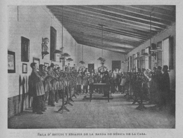 Sala d'estudi de la banda. Assaig a peu dret (Imatge: L'Esquella de la Torratxa, 1896)