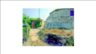 Imatge de les barraques del cim del turó de la Rovira