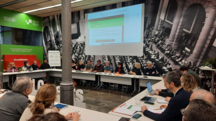 Reunió a la sala del Consell Municipal de Cooperació Internacional